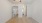 empty room with two entrances and wood floors