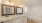 a bathroom with twin sinks a toilet and a tub